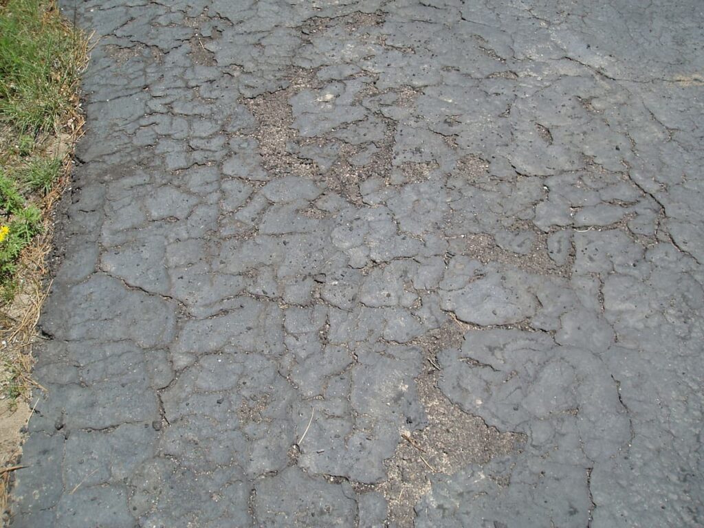 Sealing Asphalt DrivewaysThe Pros And Cons All About Driveways