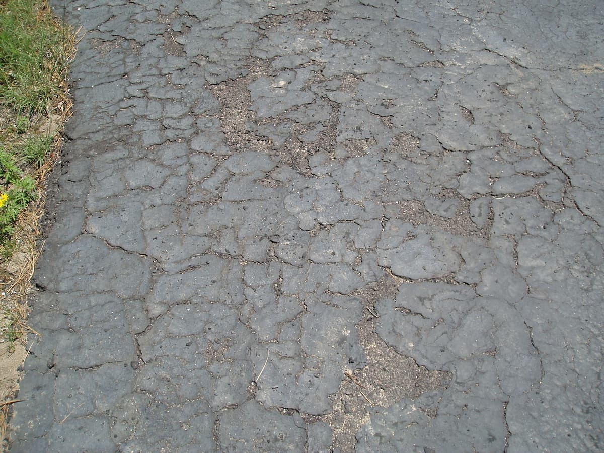 Sealing Asphalt DrivewaysThe Pros And Cons All About Driveways